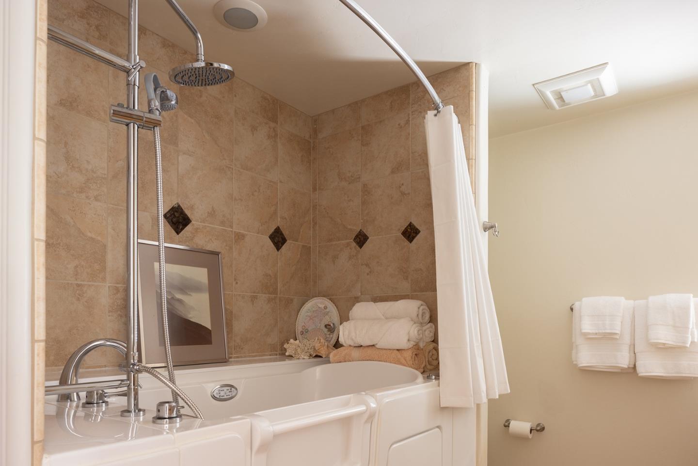 594 Viejo Road Carmel, CA 93923 - Photo 15 of 23 a bathroom with a sink and mirror