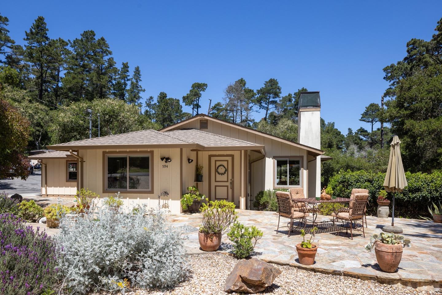 594 Viejo Road Carmel, CA 93923 - Photo 23 of 23 a front view of a house with garden