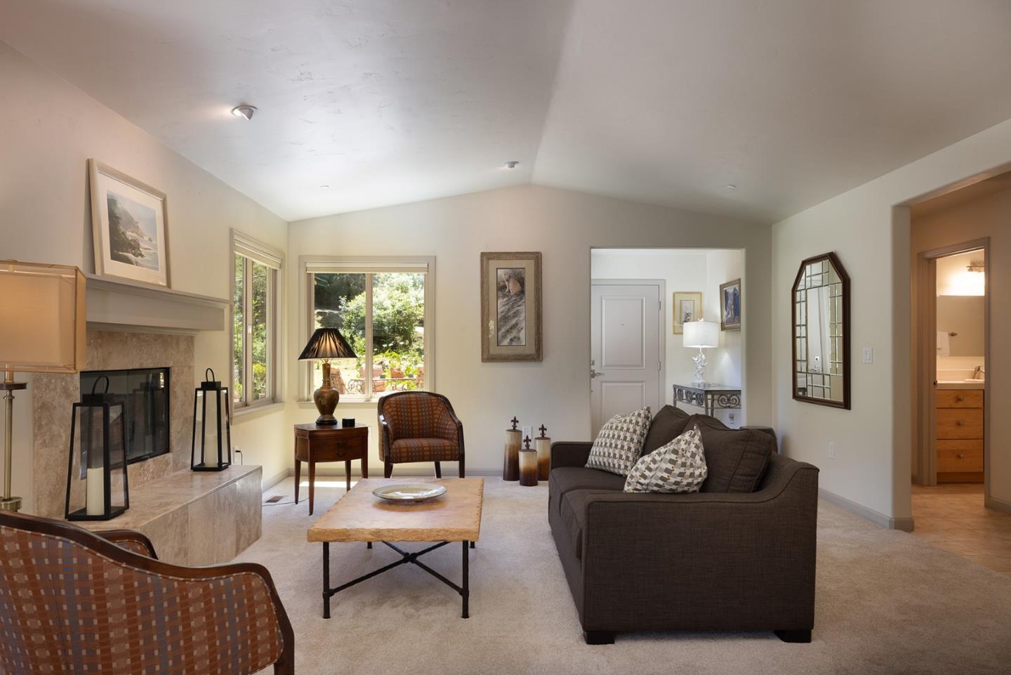 594 Viejo Road Carmel, CA 93923 - Photo 5 of 23 a living room with furniture and a potted plant