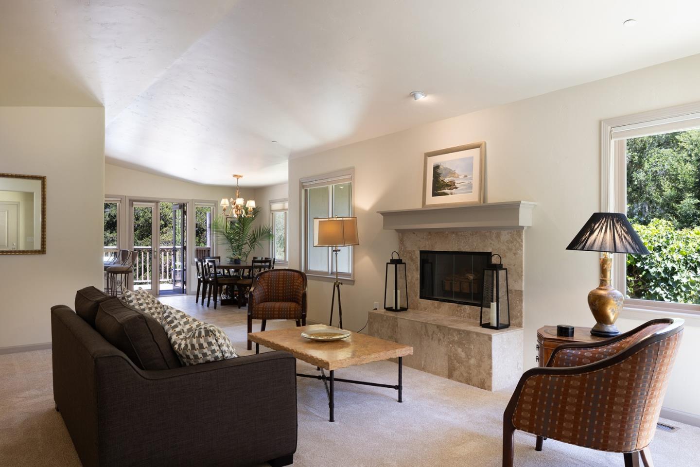 594 Viejo Road Carmel, CA 93923 - Photo 6 of 23 a living room with furniture and a fireplace
