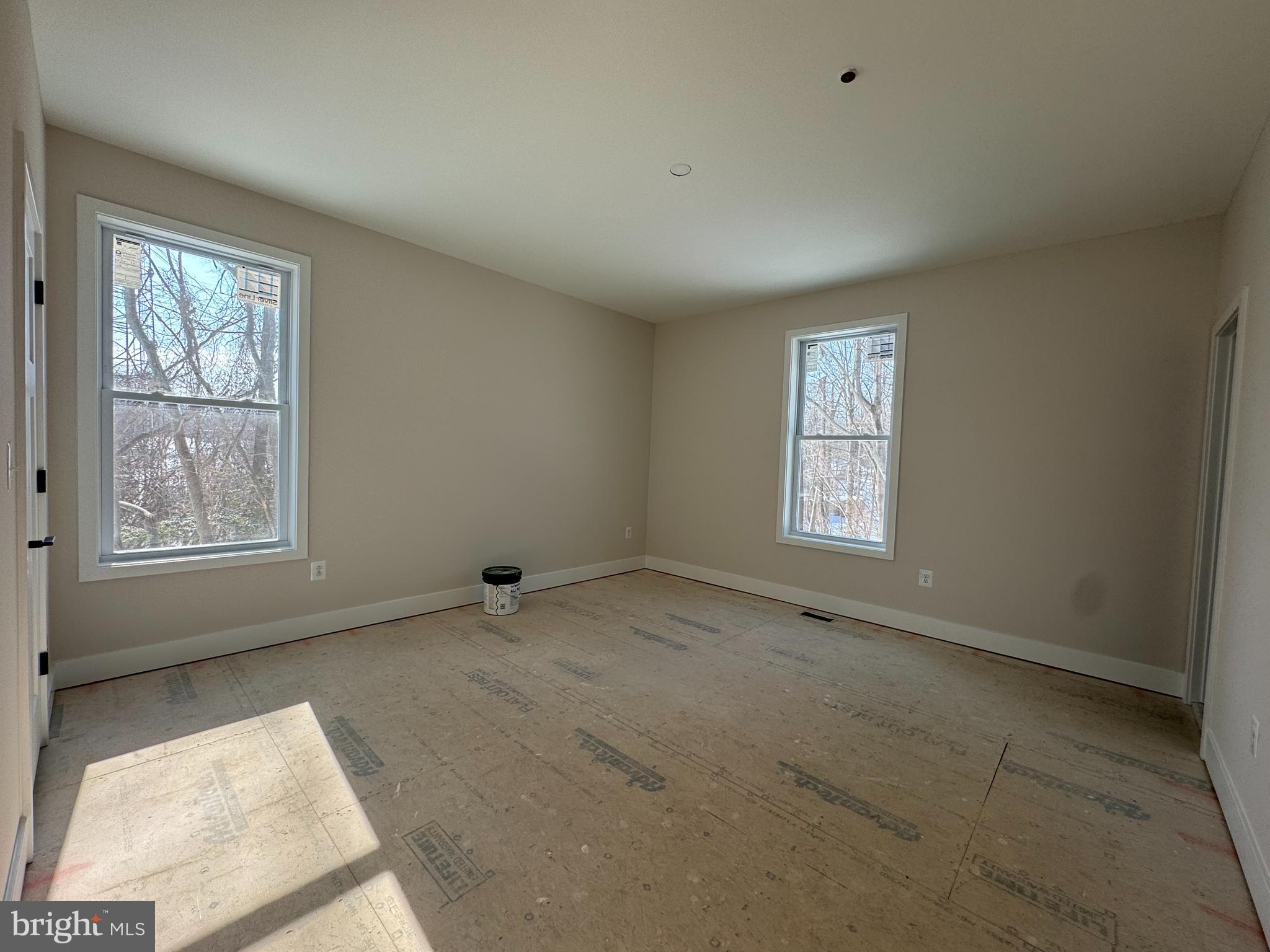 1362 Solomons Island Road Huntingtown, MD 20639 - Photo 11 of 16 an empty room with windows