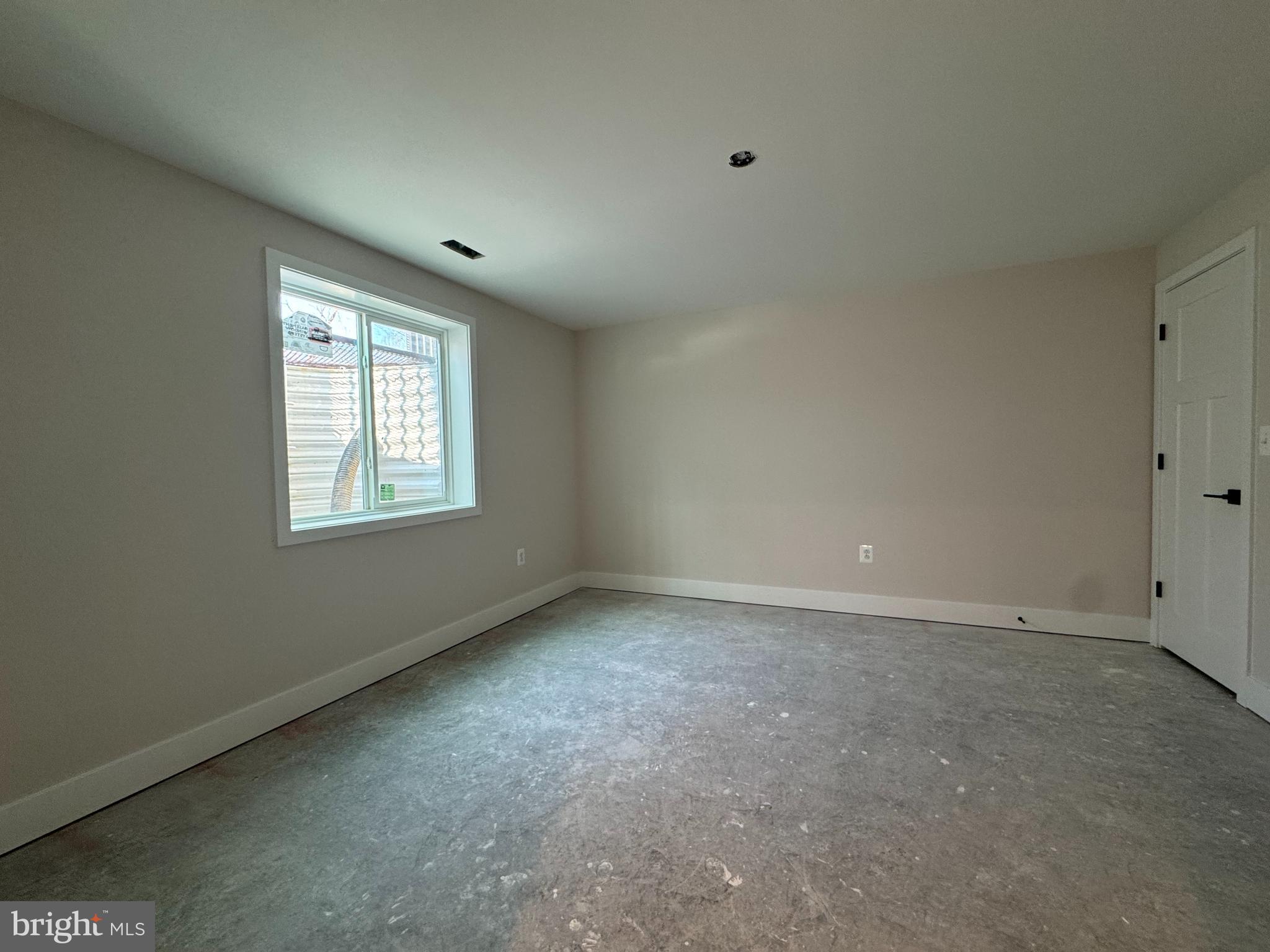 1362 Solomons Island Road Huntingtown, MD 20639 - Photo 15 of 16 an empty room with windows