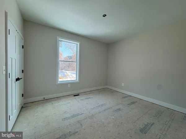 an empty room with a window