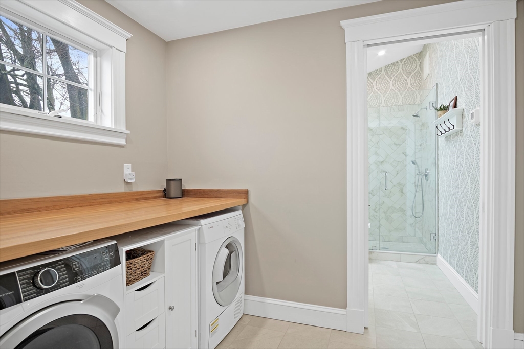8 Flagg Street Woburn, MA 01801 - Photo 17 of 25 a utility room with dryer and washer