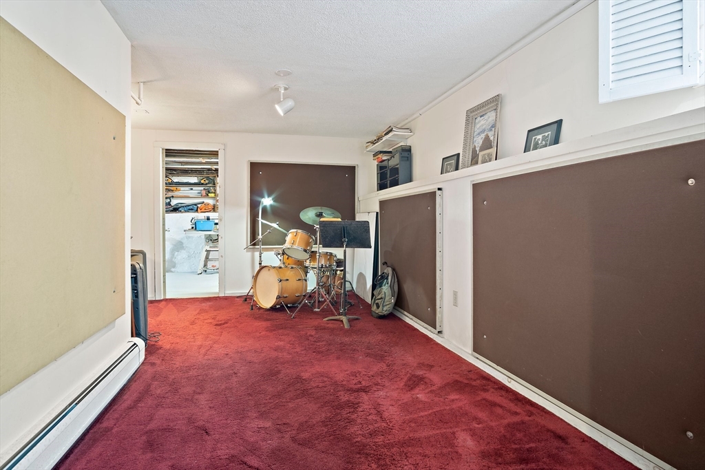 8 Flagg Street Woburn, MA 01801 - Photo 19 of 25 a view of a room with gym equipment