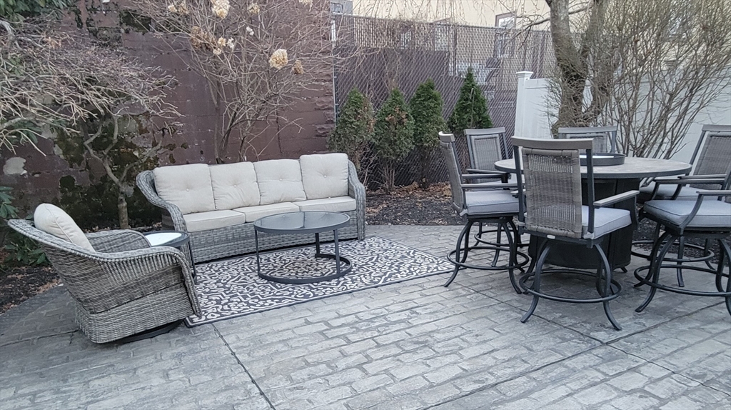 8 Flagg Street Woburn, MA 01801 - Photo 24 of 25 a outdoor space with furniture