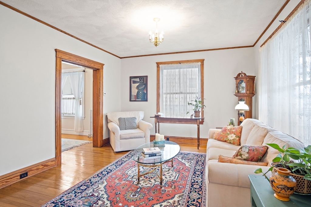 8 Flagg Street Woburn, MA 01801 - Photo 8 of 25 a living room with furniture and a window