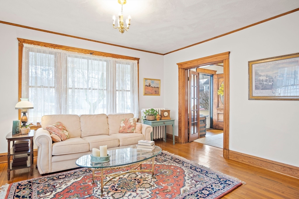 8 Flagg Street Woburn, MA 01801 - Photo 9 of 25 a living room with furniture and a window