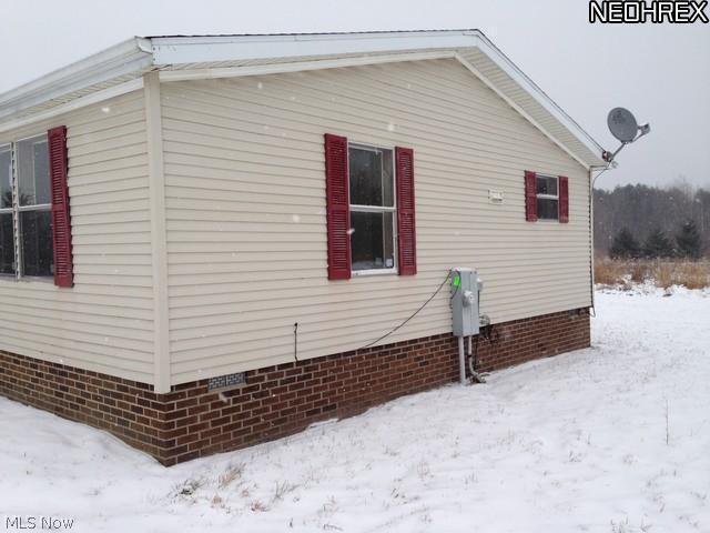 5336 Mechanicsville Road Rome, OH 44085 - Photo 2 of 13 side