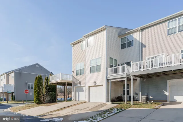 a front view of a house with a porch