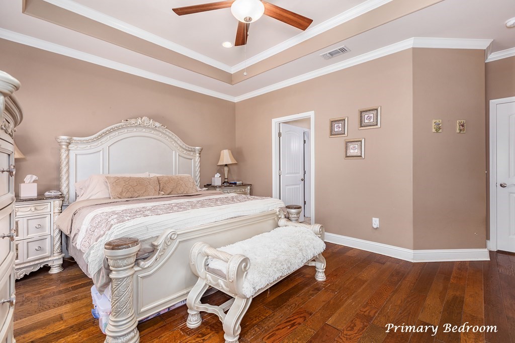 1171 Old Ewing Road Lufkin, TX 75901 - Photo 15 of 49 a bedroom with a bed and a night stand