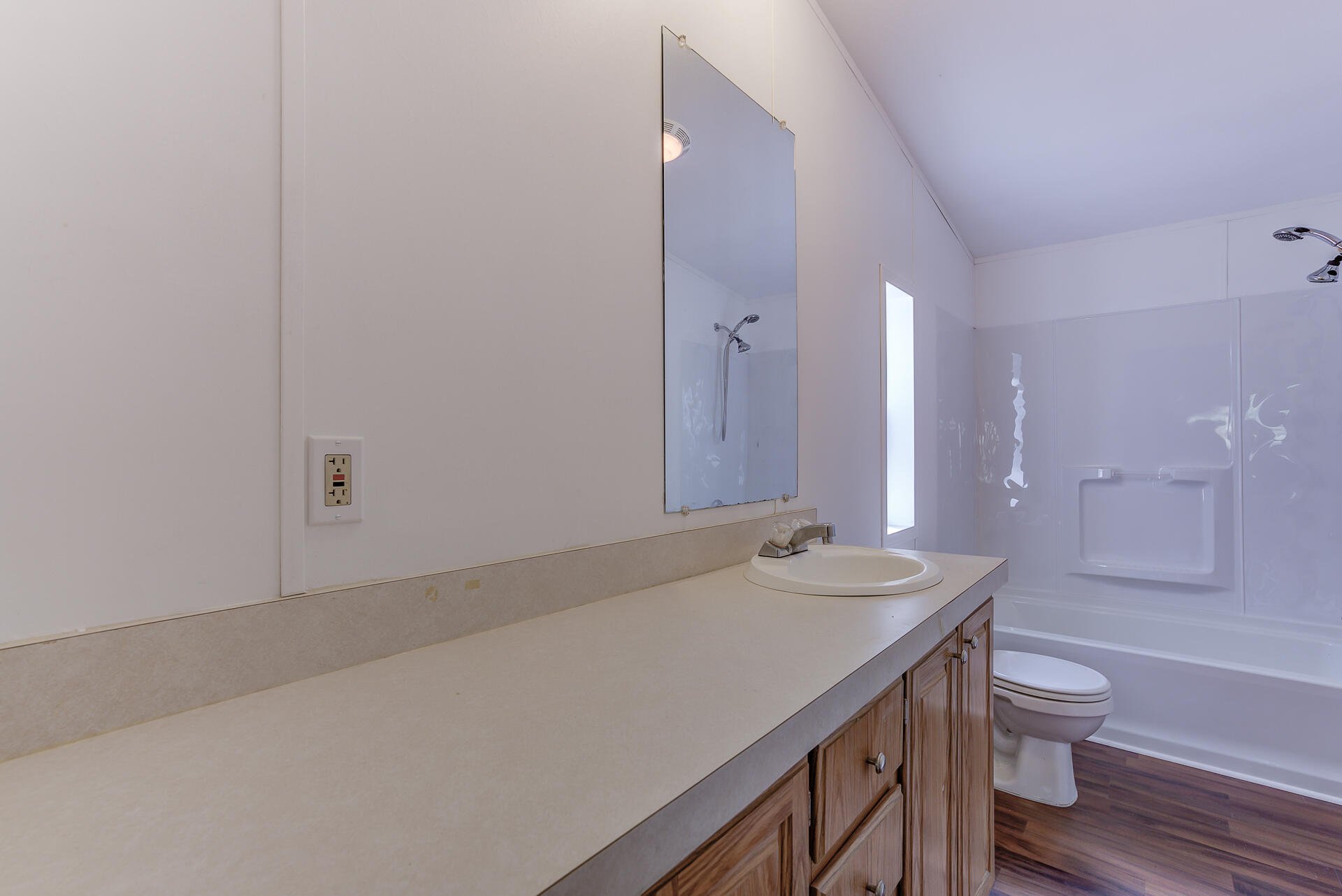 13905 Trinity Mountain Road, Unit CLEAR CREEK MOBILE PARK French Gulch, CA 96033 - Photo 13 of 24 a bathroom with a sink a toilet and shower