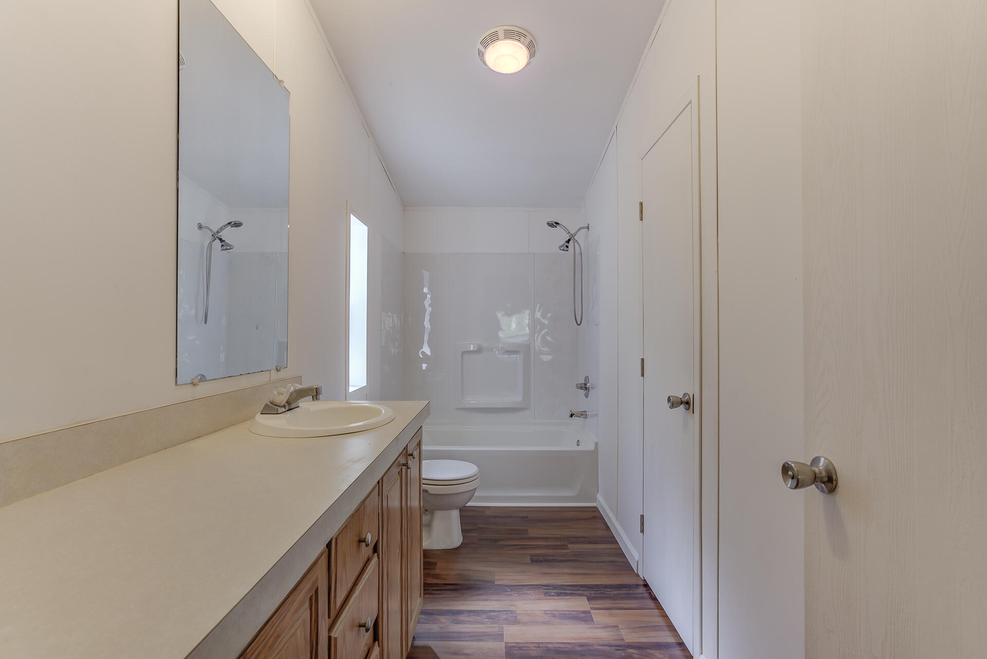 13905 Trinity Mountain Road, Unit CLEAR CREEK MOBILE PARK French Gulch, CA 96033 - Photo 14 of 24 a bathroom with a sink a toilet and shower