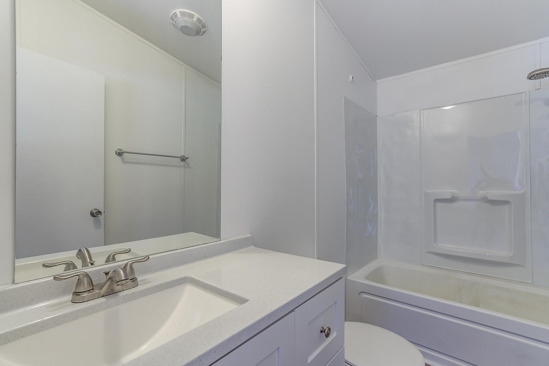 13905 Trinity Mountain Road, Unit CLEAR CREEK MOBILE PARK French Gulch, CA 96033 - Photo 15 of 24 a bathroom with a granite countertop sink toilet and shower