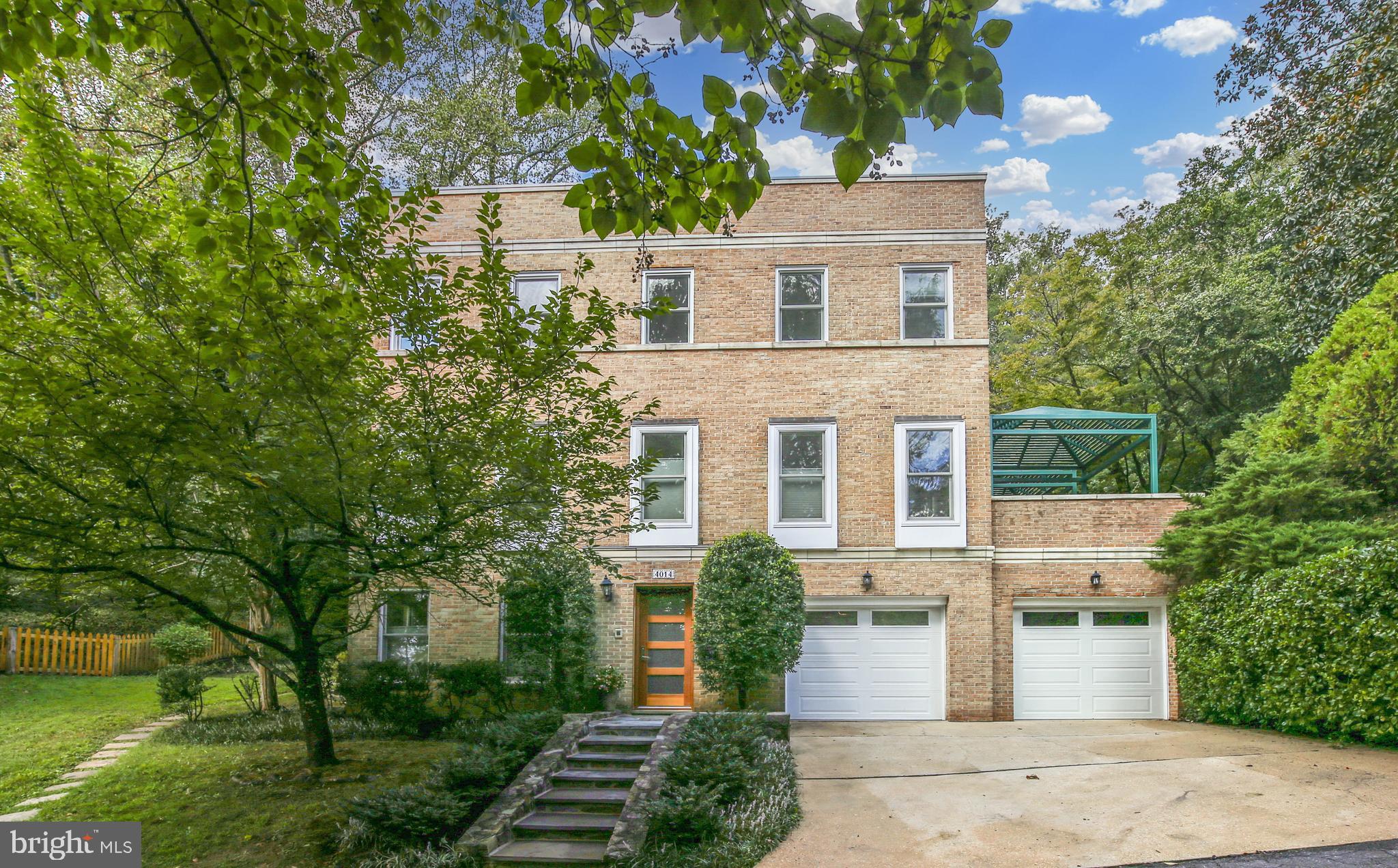 4014 Linnean Avenue Northwest Washington, DC 20008 - Photo 1 of 8 front view of a house with a yard