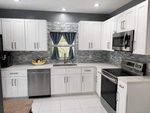$594,000 | 7629 Sanctuary Drive, Coral Springs, FL 33065