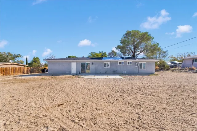 a view of a street with a building in the background