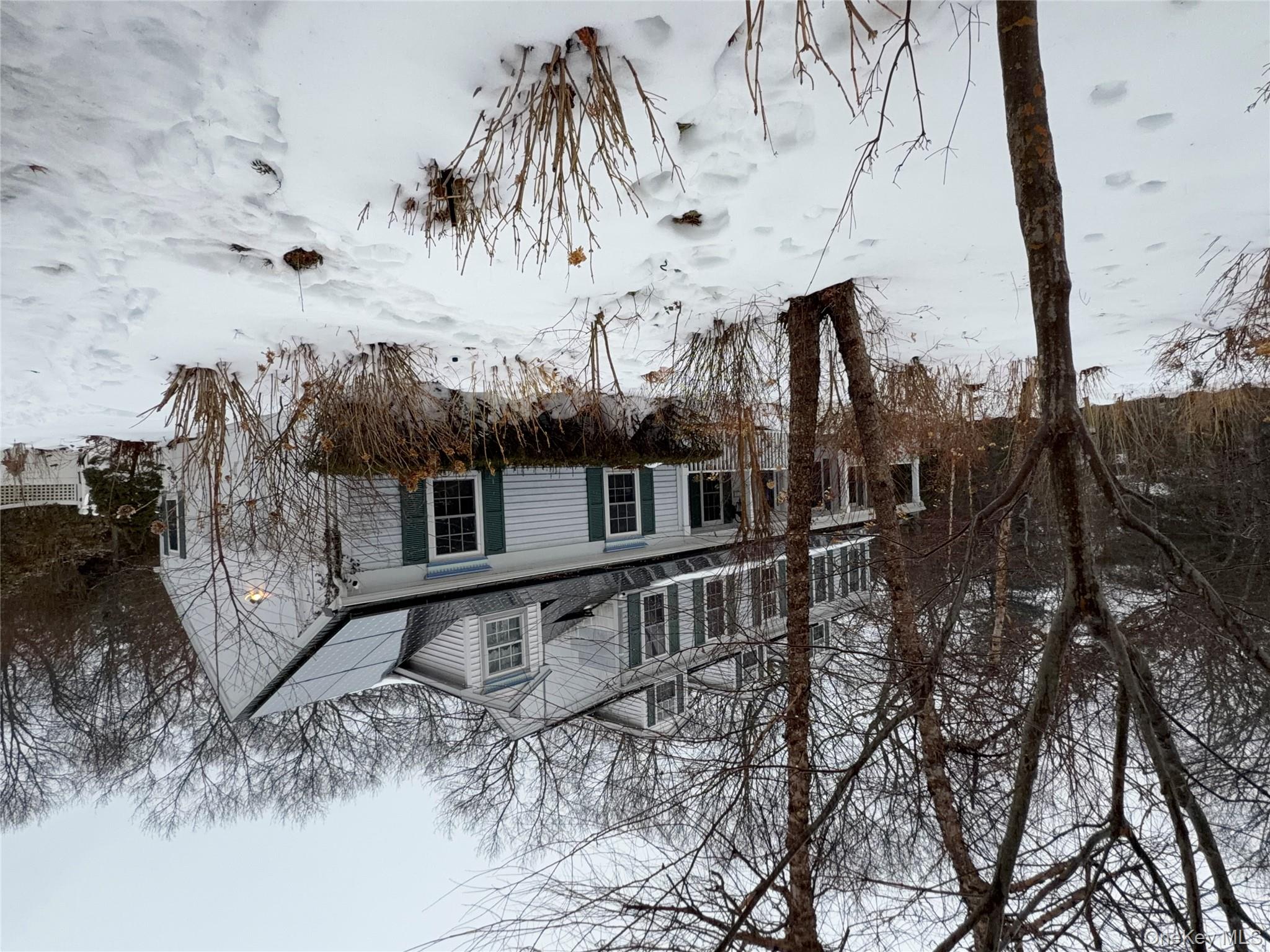 31 Upper Sheep Pasture Road East Setauket, NY 11733 - Photo 1 of 1 a view of a house covered in snow