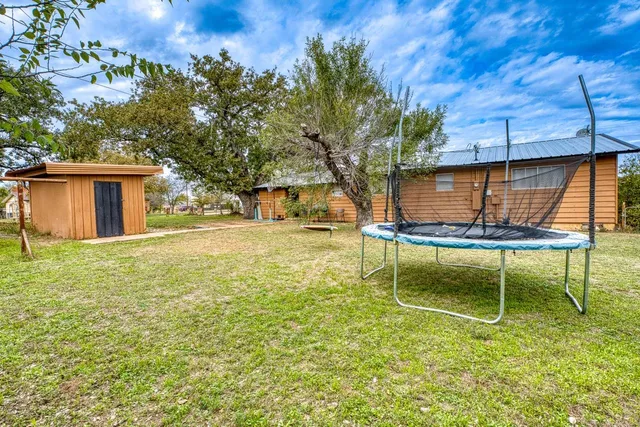a house view with a garden space