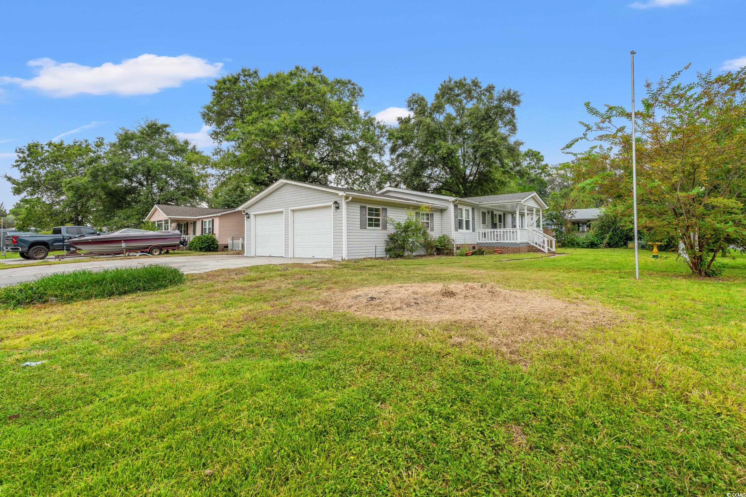 516 Grapevine Street Myrtle Beach, SC 29579 - Photo 28 of 33 Ranch-style home featuring a garage, a front yard,
