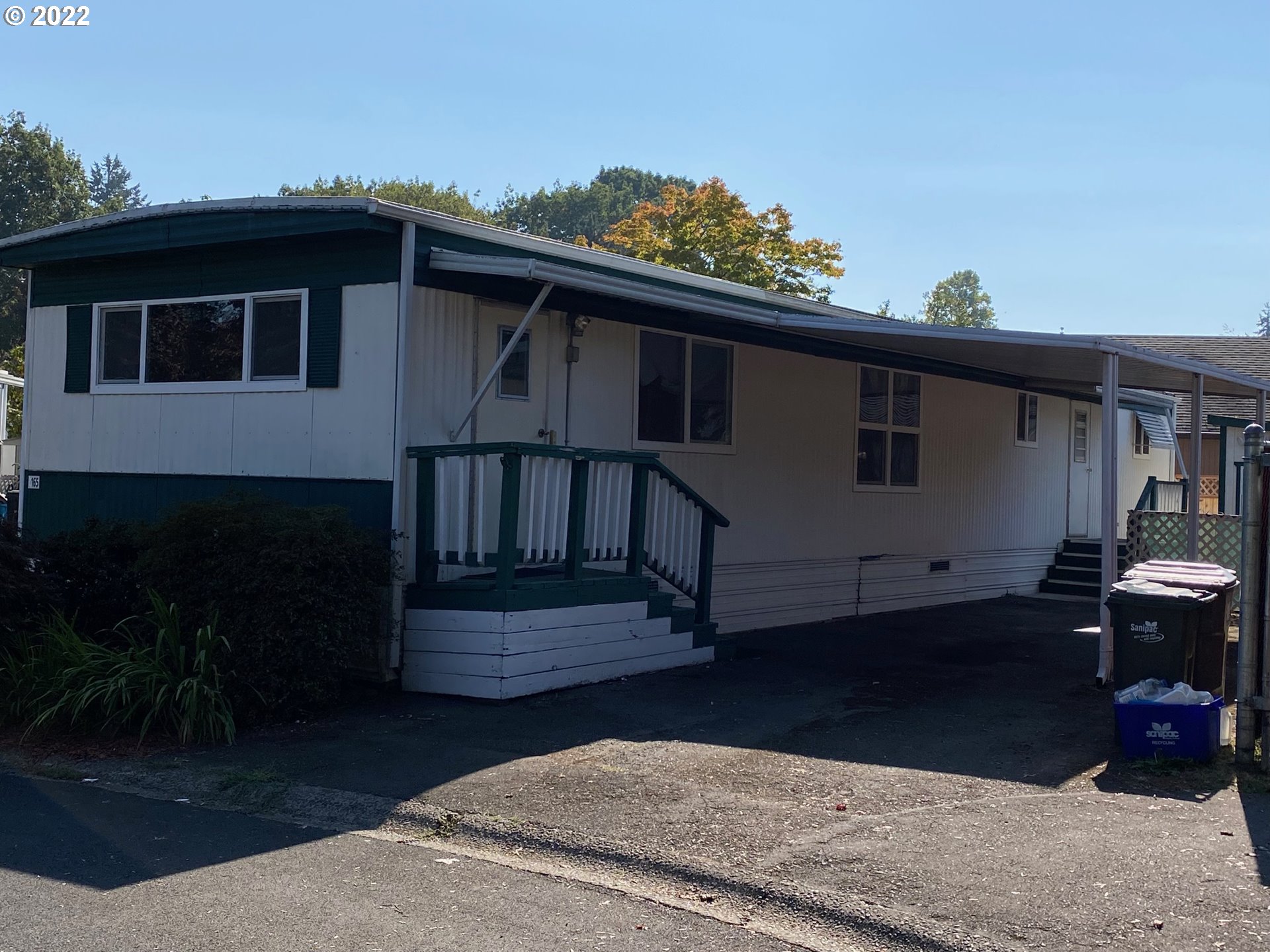 1475 Green Acres Road, Unit 165 Eugene, OR 97408 - Photo 2 of 14 a view of house with a yard