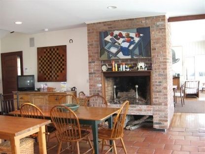 383 Rose Hill Road Water Mill, NY 11976 - Photo 7 of 13 a view of a dining room with furniture