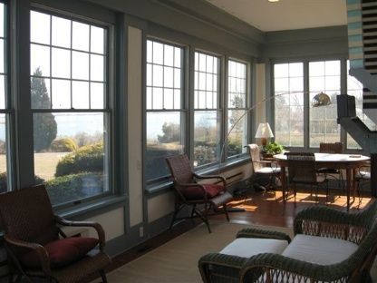 383 Rose Hill Road Water Mill, NY 11976 - Photo 10 of 13 a living room with furniture and a floor to ceiling window