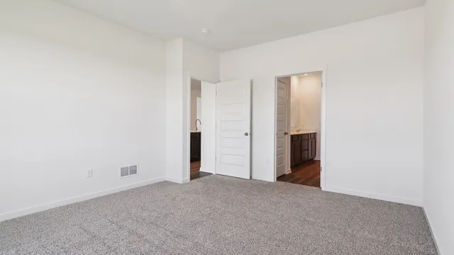 a bathroom with a sink and shower