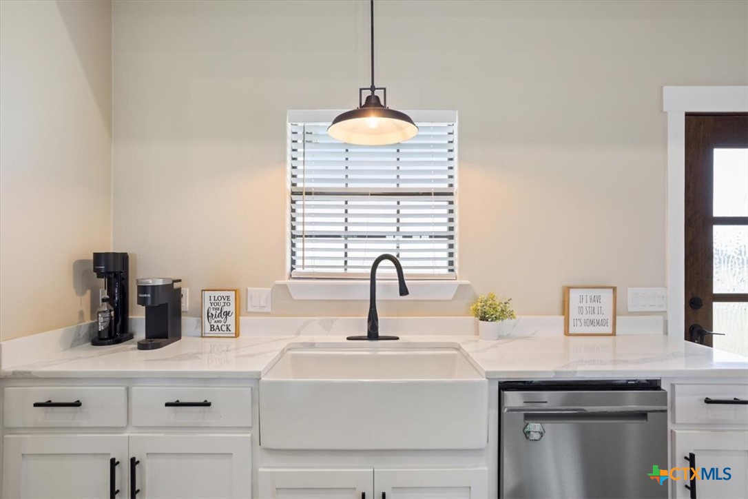 1490 Dos Hermanas Road Salado, TX 76571 - Photo 14 of 43 a bathroom with a sink and a window