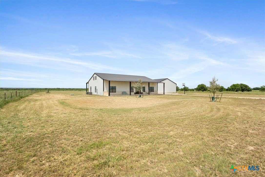1490 Dos Hermanas Road Salado, TX 76571 - Photo 3 of 43 a house view with swimming pool in front of it
