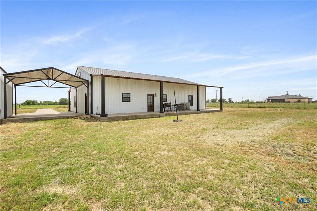 1490 Dos Hermanas Road Salado, TX 76571 - Photo 34 of 43 a front view of a house with a ocean view