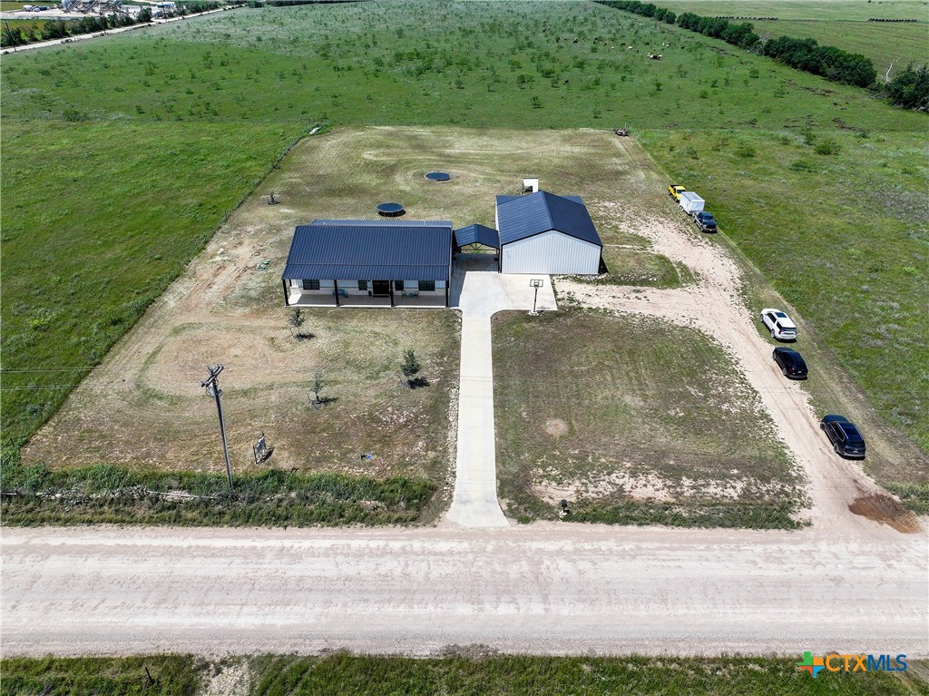 1490 Dos Hermanas Road Salado, TX 76571 - Photo 42 of 43 an aerial view of a house with a yard