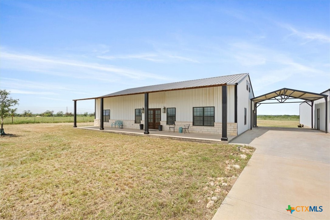 1490 Dos Hermanas Road Salado, TX 76571 - Photo 6 of 43 a view of a house with backyard and ocean view