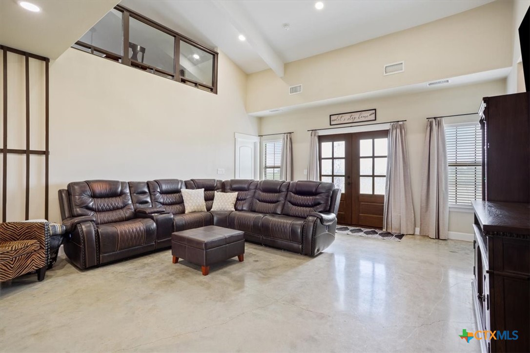 1490 Dos Hermanas Road Salado, TX 76571 - Photo 8 of 43 a living room with furniture and a flat screen tv