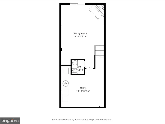 a picture of a bench in front of a wall