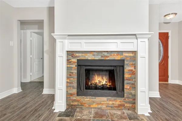 a living room with a fireplace