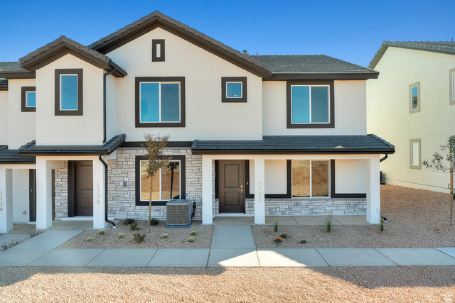 2174 Wolverine Way, Unit 2537 Washington, UT 84780 - Photo 1 of 1 View of front of house featuring stone siding, stucco siding, and a shingle roof