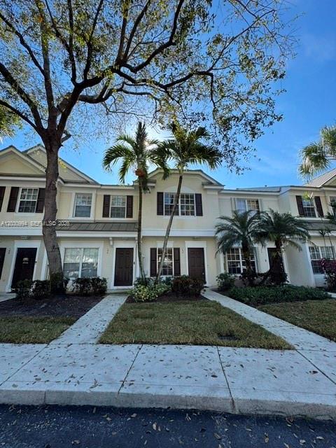 192 Southwest 96th Avenue, Unit 192 Plantation, FL 33324 - Photo 15 of 15 front view of house with a yard
