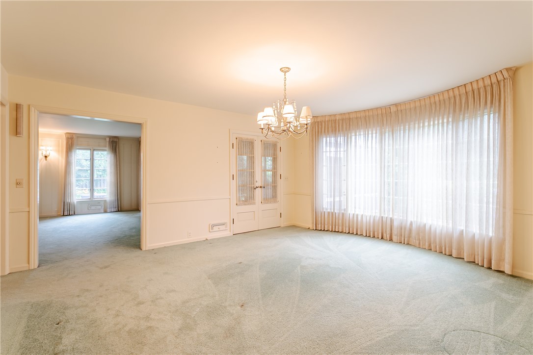 200 Monteroy Road Brighton, NY 14618 - Photo 11 of 41 Formal Dining Room with door to 3 season room