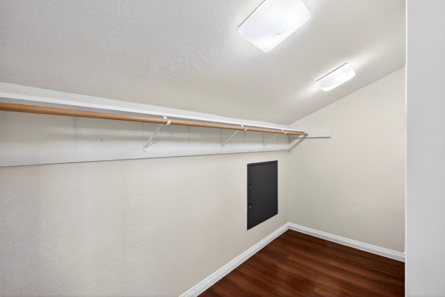 22330 Homestead Road, Unit 214 Cupertino, CA 95014 - Photo 24 of 35 a view of an empty room with wooden floor