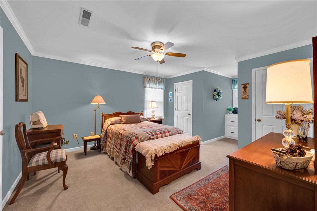 1010 Ridgeview Drive Pendleton, SC 29670 - Photo 31 of 47 This spacious bedroom offers comfortable living with carpet flooring and ample natural light.