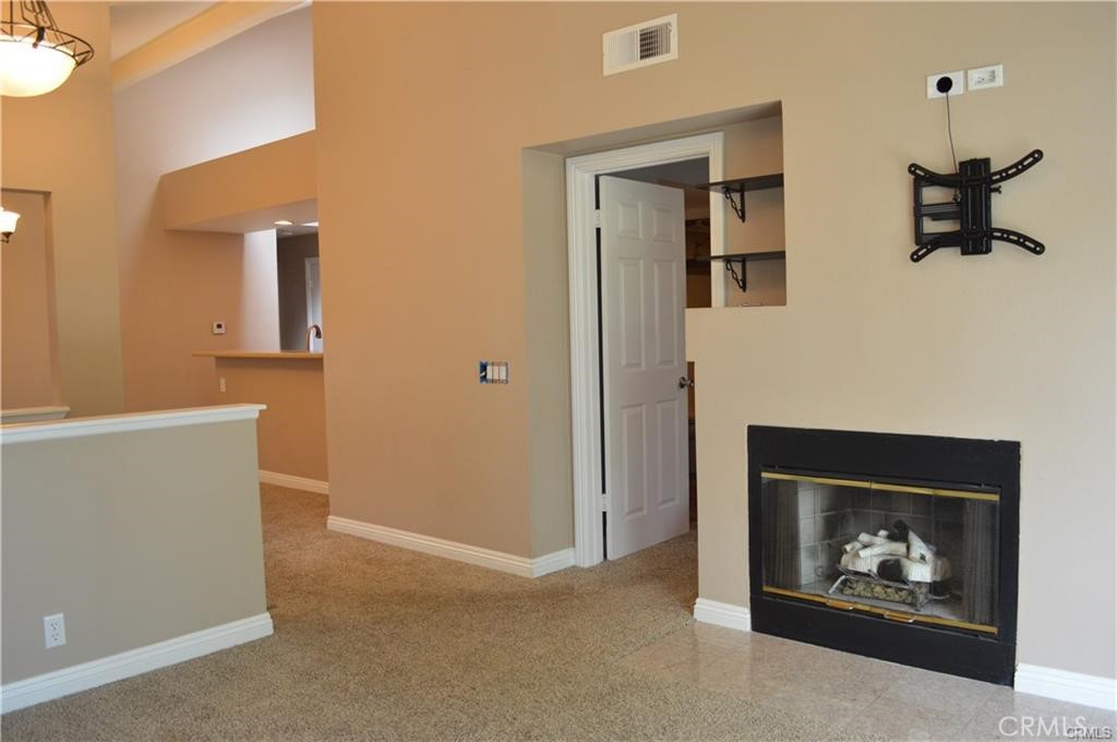 64 Lobelia Rancho Santa Margarita, CA 92688 - Photo 2 of 14 Living Room with Fireplace