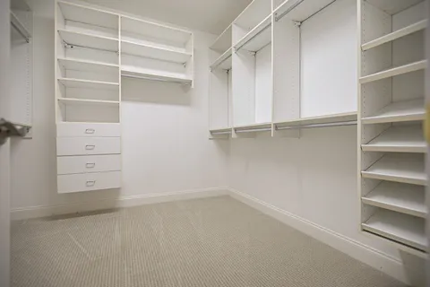 a view of an empty walk in closet
