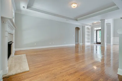 a view of a livingroom with wooden floor