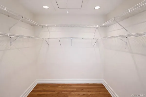 a view of a room with racks on the wall