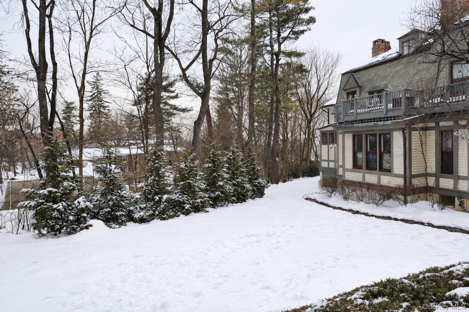 16 Clinton Avenue Dobbs Ferry, NY 10522 - Photo 26 of 26 a view of a house with a snow in the yard