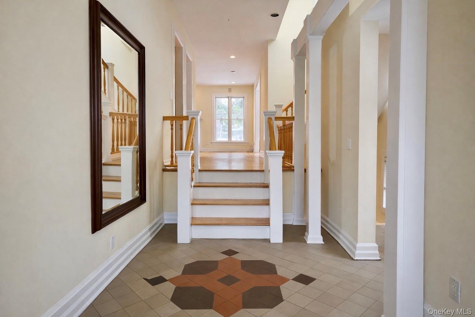 16 Clinton Avenue Dobbs Ferry, NY 10522 - Photo 9 of 26 a view of a hallway with entryway and staircase