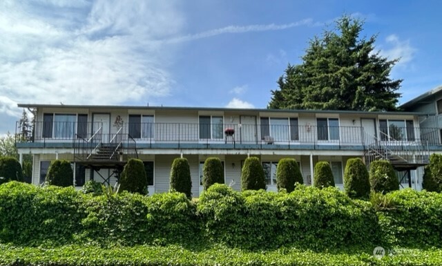 a aerial view of a house with a swimming pool