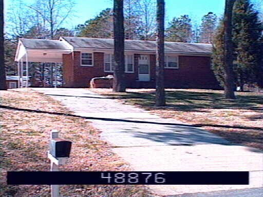 2602 Friendly Trail Raleigh, NC 27610 - Photo 2 of 2 a black and white photo of a outdoor space