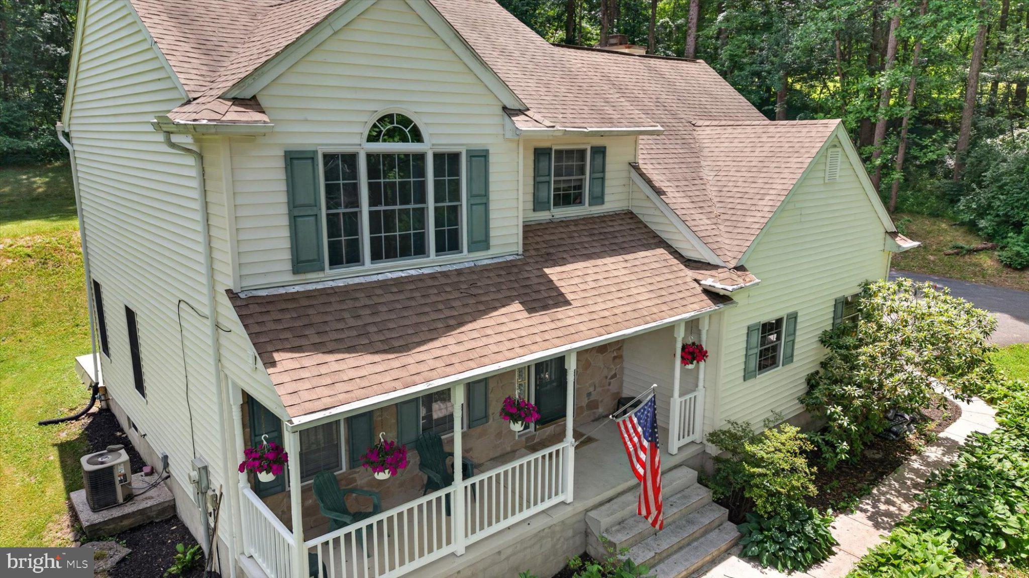 802 Hollow Road Delta, PA 17314 - Photo 2 of 45 Charming home nestled in nature's embrace.
